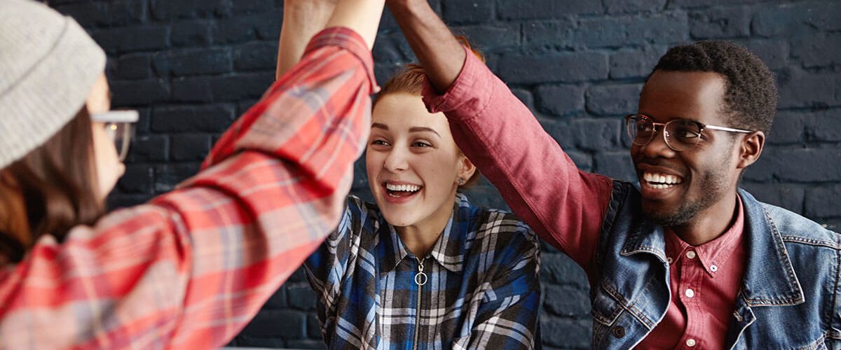 business-startup-and-teamwork-happy-and-enthusi-TDAX6MJ.jpg